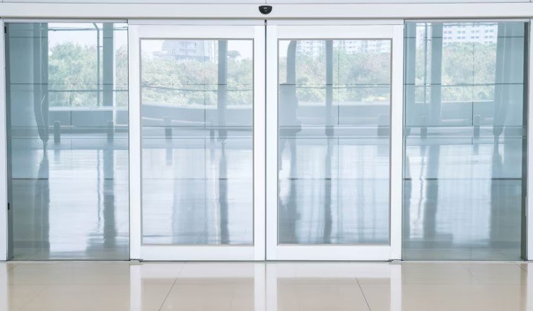 How is the installation of folding glass doors different from traditional doors?